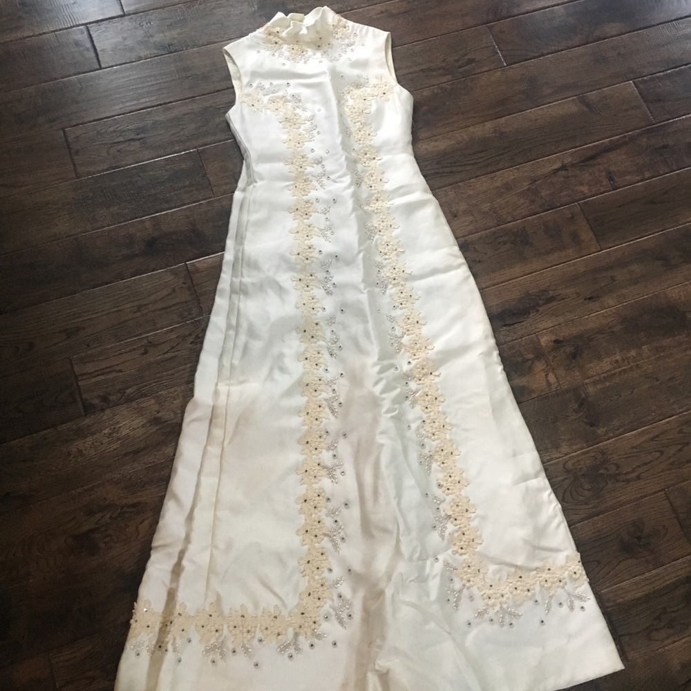 High-Neck Ivory Wedding Gown with Delicate Lace Trim